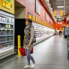 Customers shop for produce at a grocery store on Feb. 12, 2025 in Austin, Texas.