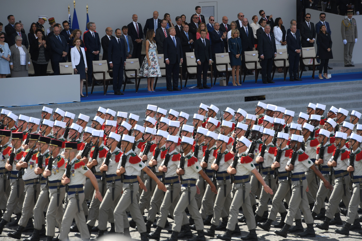 (FromL) French Defence Minister Florence Parly, French Prime Minister Edouard Philippe, US President Donald Trump and his wife First Lady Melania Trump, French President Emmanuel Macron and his wife Brigitte Macron, Senate President Gerard Larcher, the President of the French National Assembly Francois de Rugy and the Mayor of Paris Anne Hidalgo watch the Bastille Day military parade on July 14, 2017.