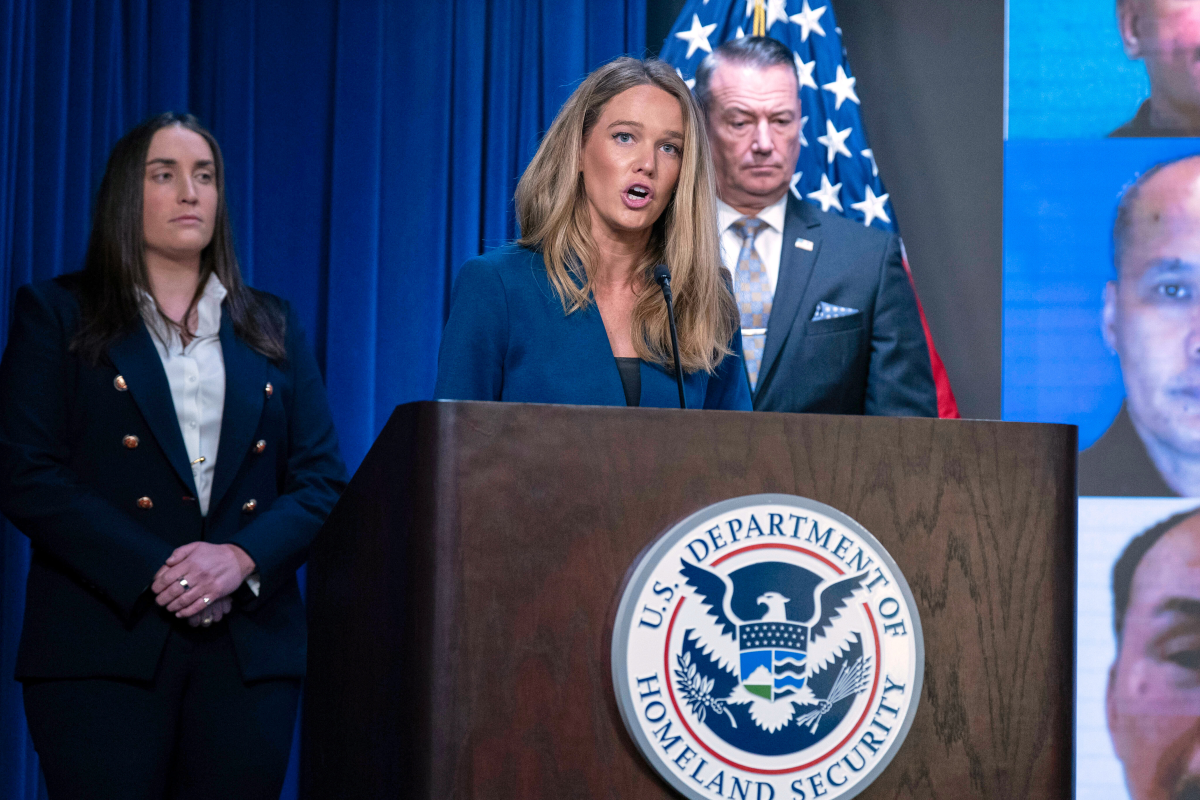 Then-DHS Assistant Secretary for Public Affairs Tricia McLaughlin, flanked by deputy director of U.S. Immigration and Customs Enforcement Madison Sheahan (left), and Acting director of U.S. Immigration and Customs Enforcement Todd Lyons, speaks during a news conference at ICE Headquarters, in Washington, D.C., on May 21, 2025.