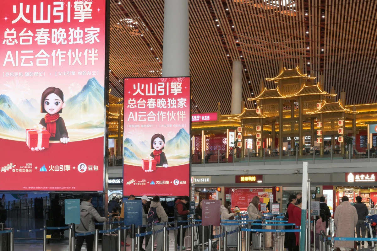 Advertising promoting ByteDance's cloud and AI service platform 'Volcano Engine' and chatbot 'Doubao' at the Beijing Capital International airport in Beijing.
