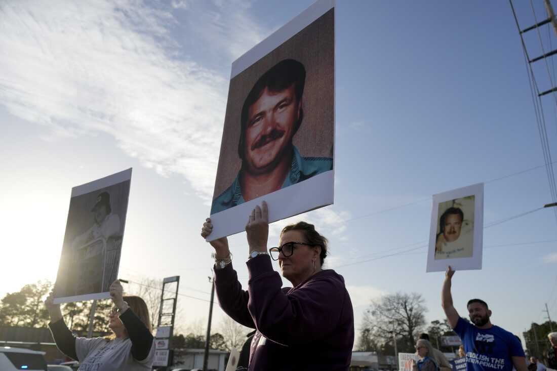Protestors demonstrate outside the scheduled execution of South Carolina inmate Brad Sigmon, Friday, March 7, 2025, in Columbia, S.C.