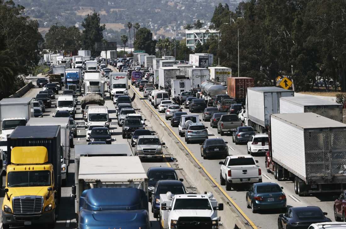 Vehicles drive on Interstate 5 ahead of the Memorial Day weekend Friday in Los Angeles. Departments of motor vehicles across the country are warning of a new batch of scam text messages that seek out recipients' personal information.