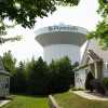 A water tower is seen on July 30 in Plymouth, Minn. A cyberattack targeted the operating technology at over 30 water systems in Minnesota, including Plymouth's late last month, state officials said.
