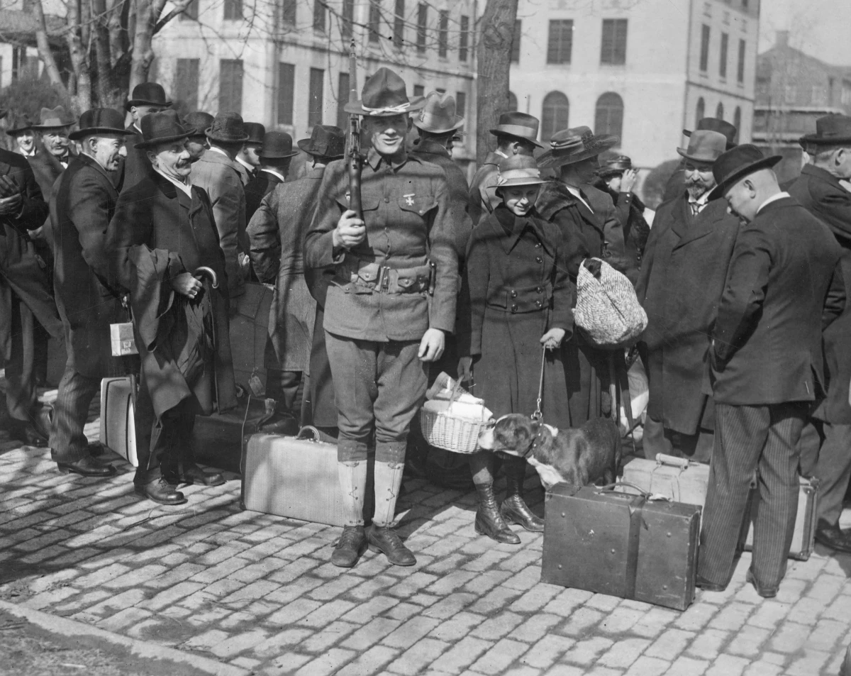 This 1918 photograph shows 'enemy aliens' being corralled by Secret Service operatives at Gloucester, N.J., on their way to internment in the South.