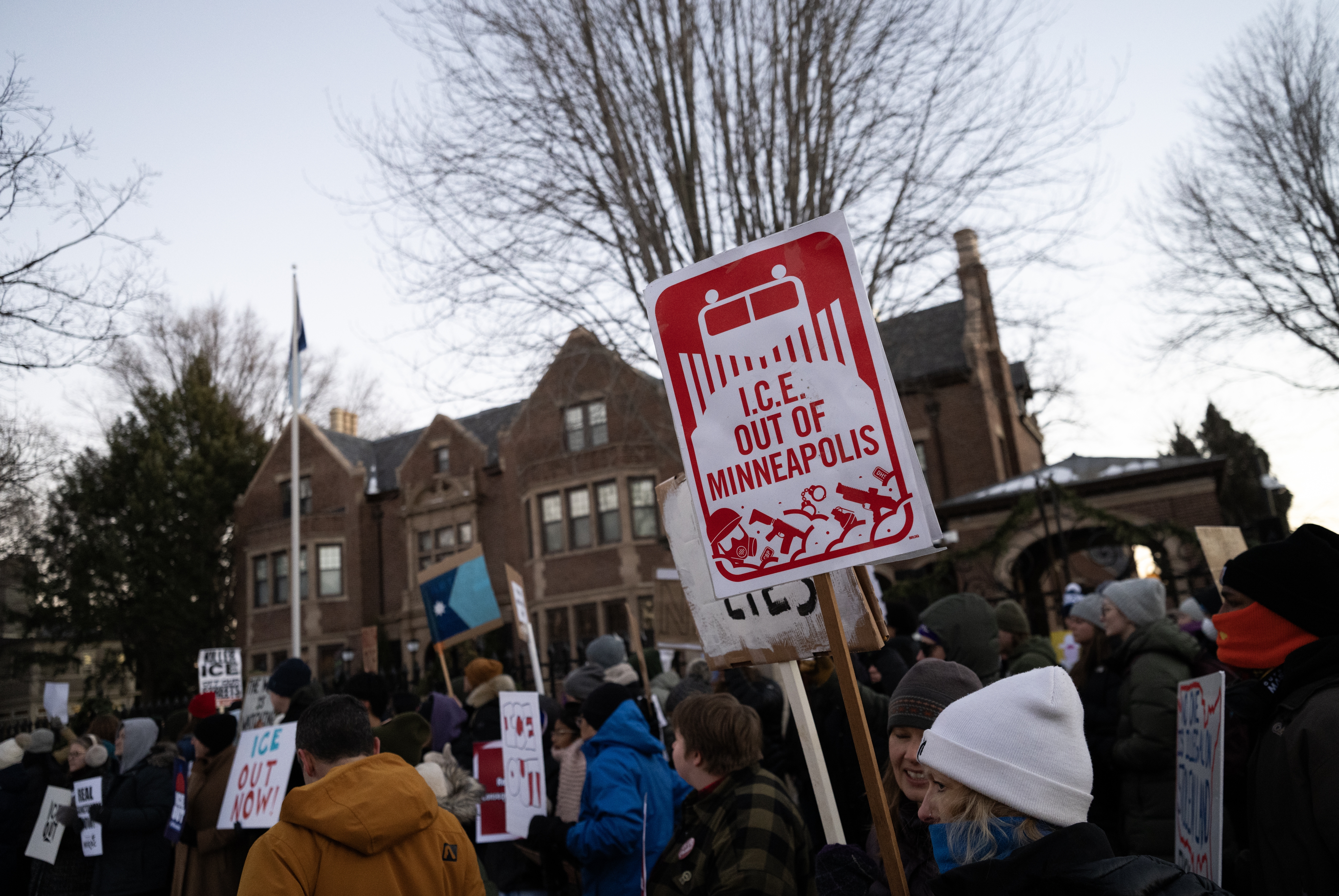 People demonstrate against federal immigration enforcement outside the Minnesota governor