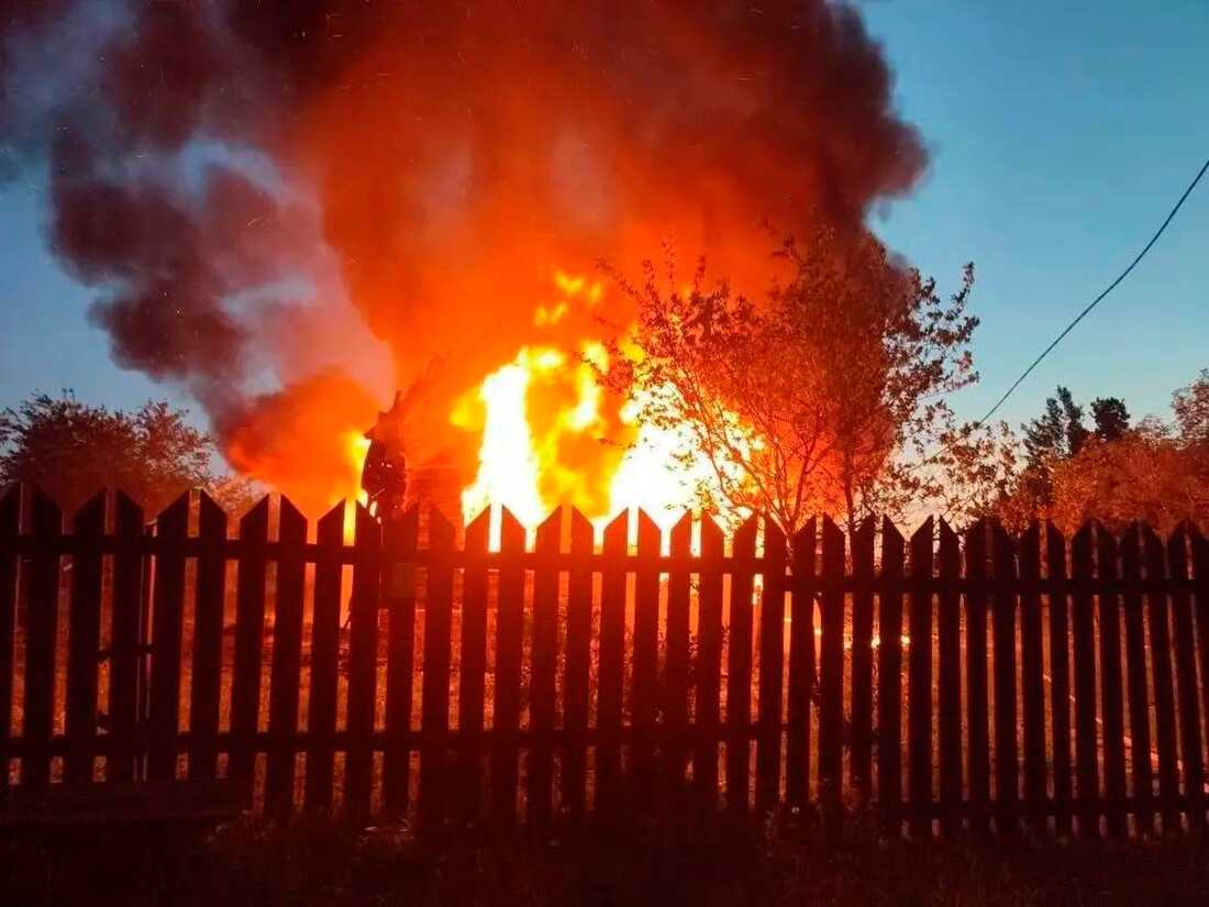 This photo released by Moscow Region Governor Andrei Vorobyev's official telegram channel shows a house on fire after a Ukrainian attack in Khimki, just outside Moscow, Russia, on Sunday, May 17, 2026.