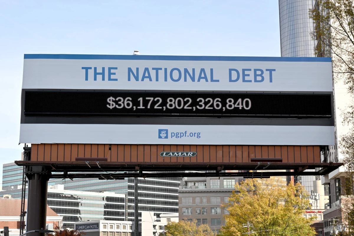 The federal debt topped $36 trillion earlier this month. A billboard in Atlanta displays what that works out to for each person in the United States.