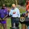 President Biden crosses himself after Buck Paulk of Shiloh Pecan Farm, in Ray City, Ga., leads a prayer on Oct. 3, 2024.eorgia, on October 3, 2024, after Biden toured areas impacted by Hurricane Helene. (Photo by Mandel NGAN / AFP) (Photo by MANDEL NGAN/AFP via Getty Images)
