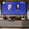 John Hopfield and Geoffrey Hinton, seen in picture, are awarded this year's Nobel Prize in Physics, which is announced at a press conference by Hans Ellergren, center, permanent secretary at the Swedish Academy of Sciences in Stockholm on Tuesday.