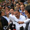 Bangladesh Nationalist Party Chairperson Tarique Rahman waves as he comes out after casting his vote during the national parliamentary elections in Dhaka, Bangladesh, Thursday, Feb. 12, 2026.