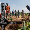 Relatives of Vanisa Anifa, a 6-month-old orphaned girl who died of Ebola, attend her burial, in Bunia, Congo, Friday, June 19, 2026.