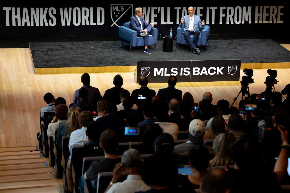 FOX Sports host Rob Stone (L) and MLS Commissioner Don Garber speak at the MLS "The Next Chapter" Press Conference on July 16, 2026 in New York City. With the World Cup ending, the MLS motto is: "Thanks world. We'll take it from here"