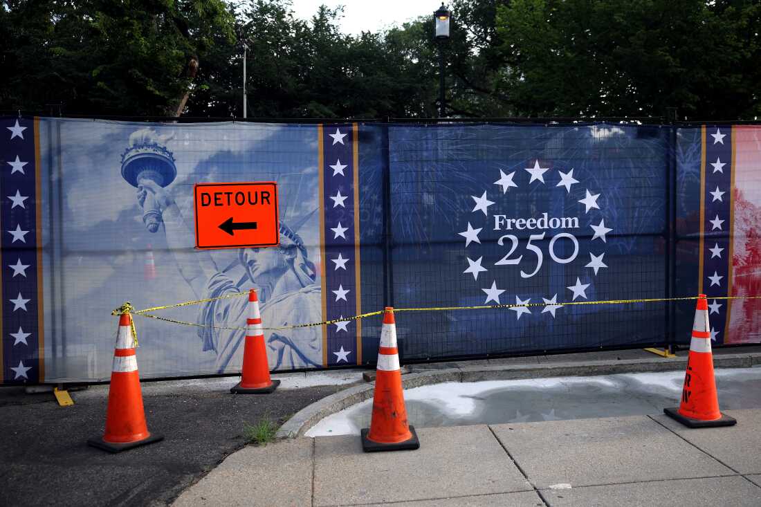 The Freedom 250 logo is visible on fencing around the National Mall on Thursday.