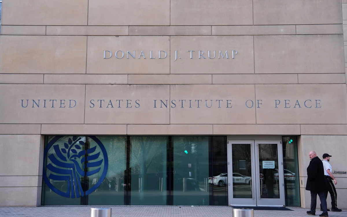 President Donald Trump's name is seen on the U.S. Institute of Peace building, Dec. 4, 2025, in Washington.