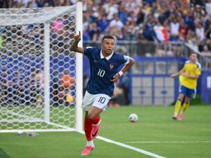 France's forward Kylian Mbappé celebrates scoring a goal against Sweden in a round of 32 match. Mbappé finished the tournament as the Golden Boot winner with 10 goals, increasing his overall World Cup total to 22, the most all-time.