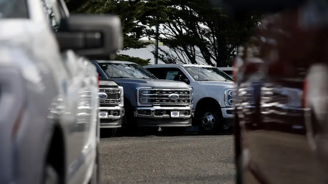  Ford pickup trucks are displayed on the sales lot at Serramonte Ford on January 06, 2026 in Colma, California.