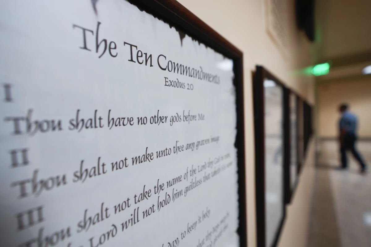 A copy of the Ten Commandments is posted along with other historical documents in a hallway at the Georgia Capitol in Atlanta on June 20, 2024. On Friday, a panel of federal appellate judges ruled that a Louisiana law requiring the Ten Commandments to be posted in the state's public school classrooms is unconstitutional.