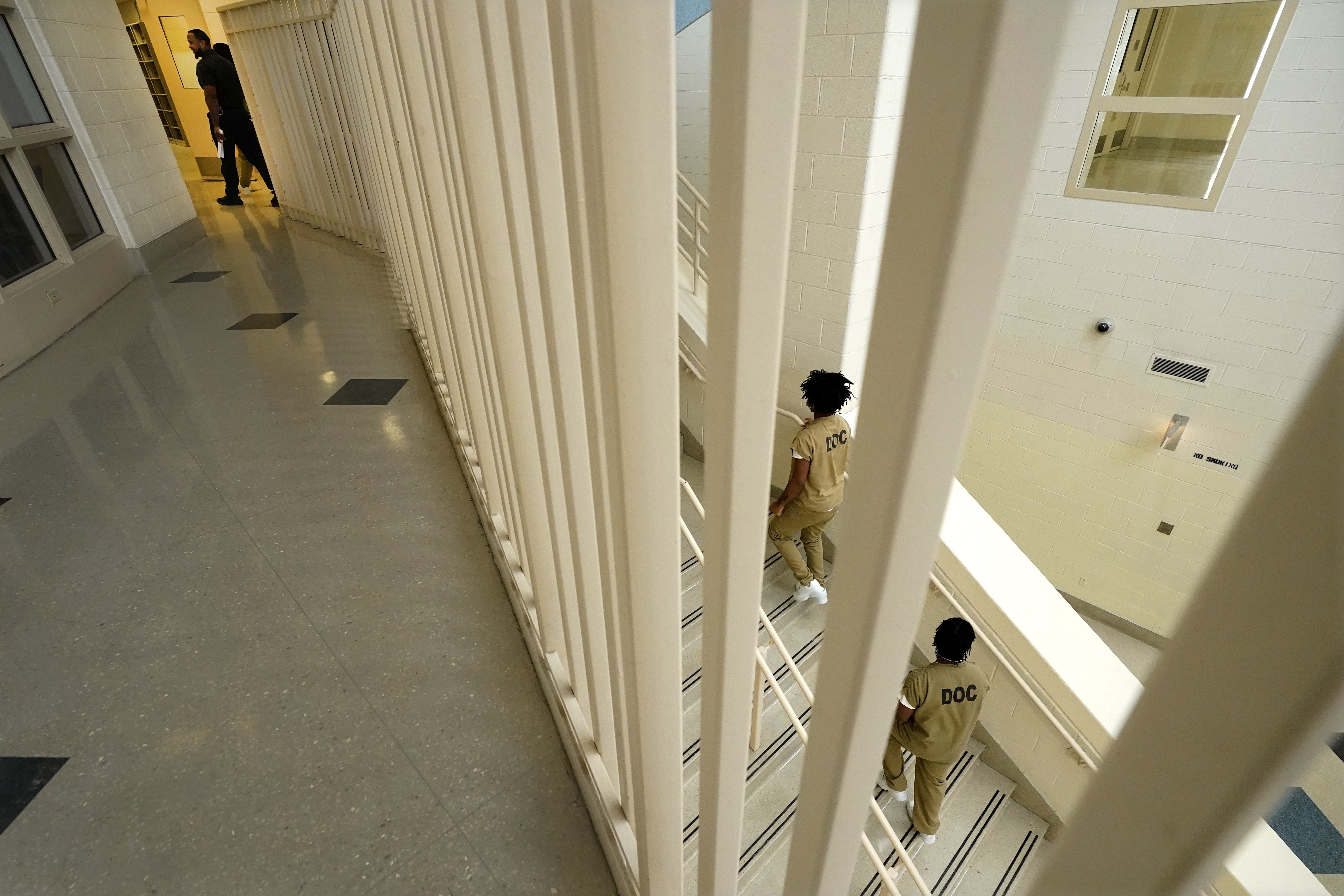 Inmates at the Cook County, Ill., jail head to a staging area at the jail's Division 11 law library before registering and voting in the local election in 2023 in Chicago. (AP)
