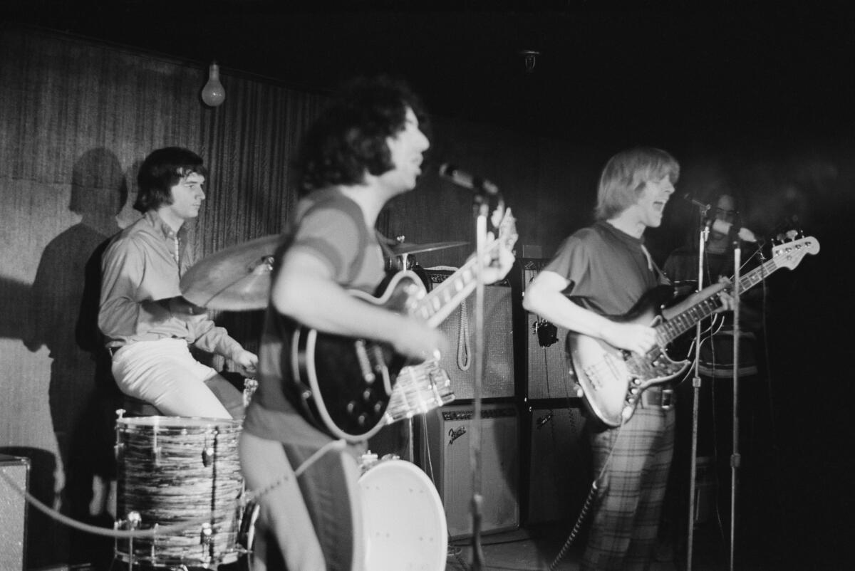 The Grateful Dead bassist Phil Lesh (right), playing with drummer Bill Kreutzmann and lead singer Jerry Garcia in 1970.