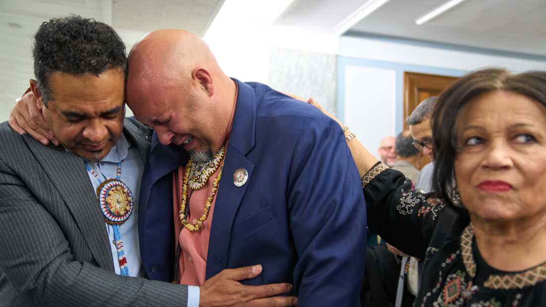 John Lowery, a New Carolina state representative and chairman of the Lumbee Tribe (right) is comforted by Rob Jacobs, as they join with other members of the tribe to celebrate Wednesday on Capitol Hill in Washington, D.C., after the passage of a bill granting the tribe federal recognition.