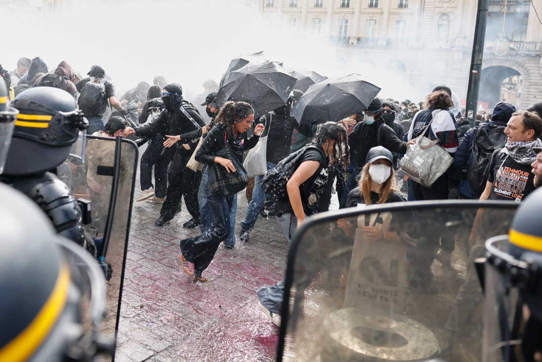 Riot police use a water cannon as they face students during a protest against under-resourced schools, in Rennes, western France, Tuesday.