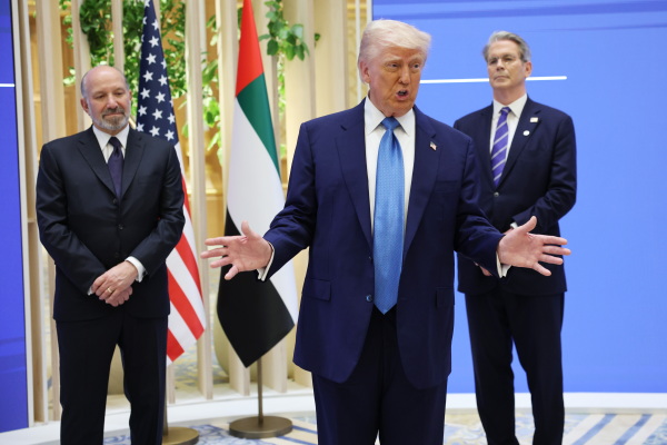 President Trump speaks at an investment forum in Abu Dhabi, United Arab Emirates, on May 16, 2025, with Commerce Secretary Howard Lutnick and Treasury Secretary Scott Bessent.