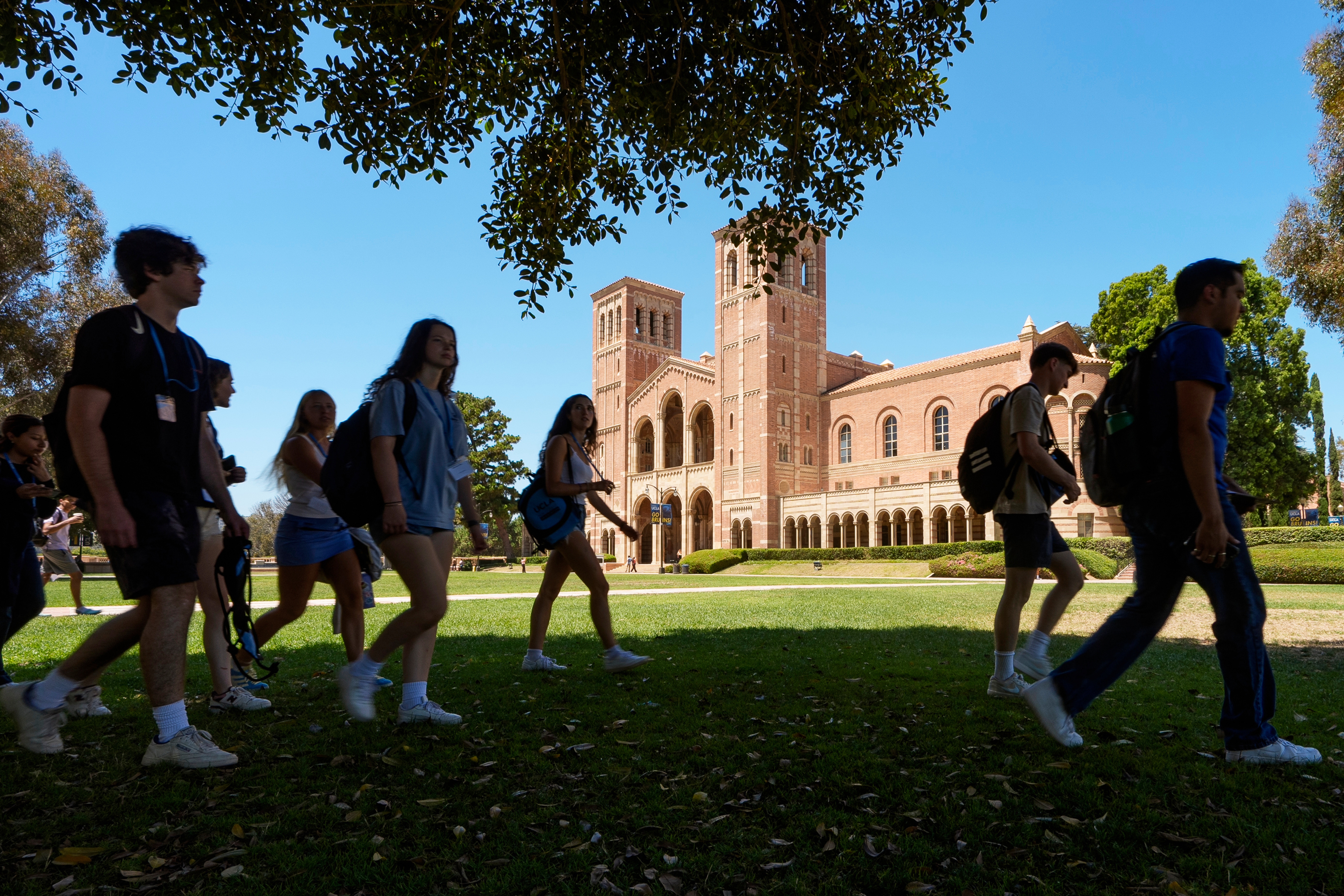 Students walk past Royce Hall on the University of California, Los Angeles campus on Aug. 15, 2024.