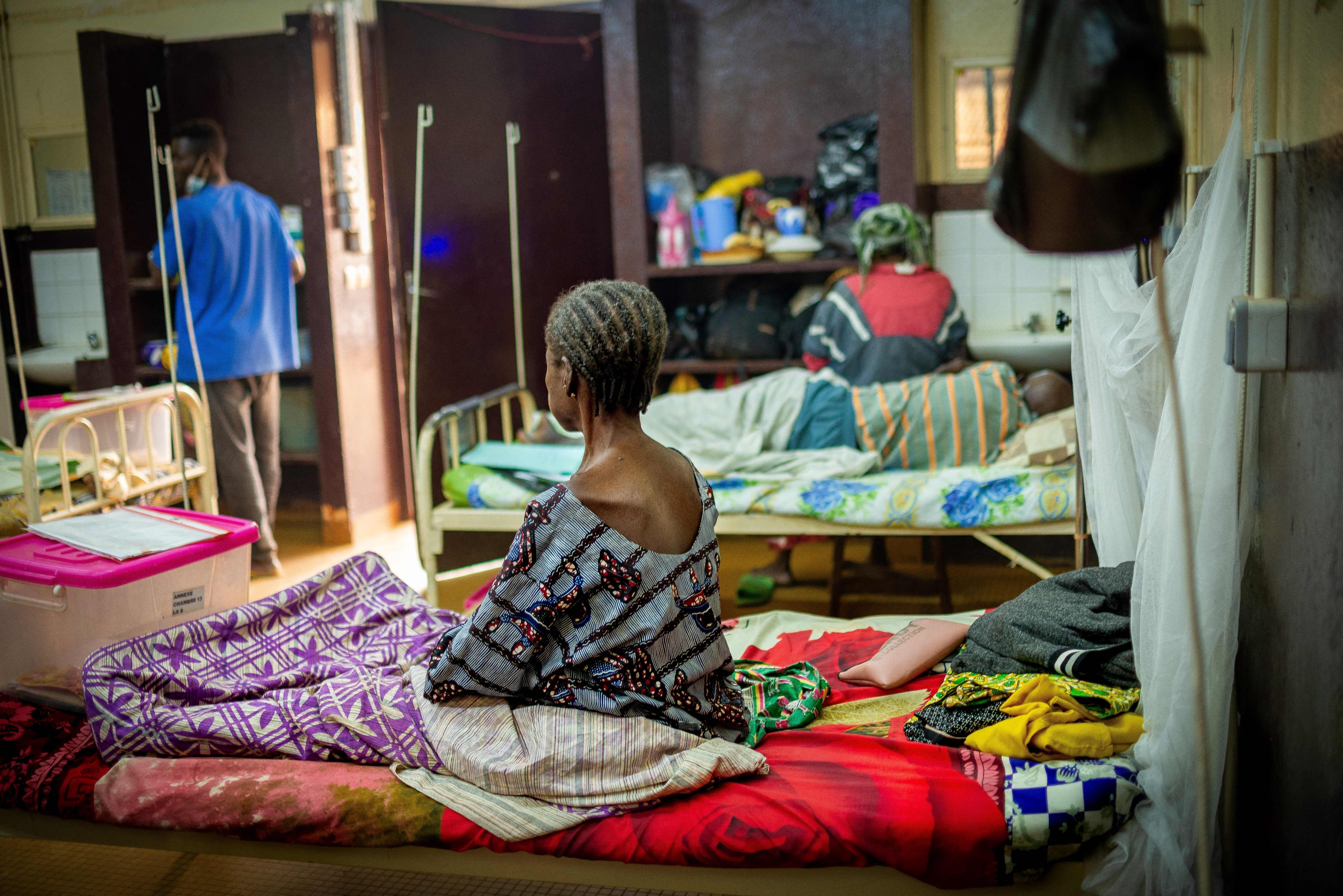 A patient with AIDS at a community hospital in the Central African Republic. Sub-Saharan Africa has high rates of HIV infection -- and was the location for a trial testing the effectiveness of a new strategy for preventing infection.<br>