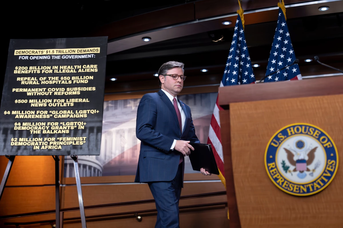 Speaker of the House Mike Johnson, R-La., arrives to talk to reporters about the government shutdown on Capitol Hill on Wednesday.