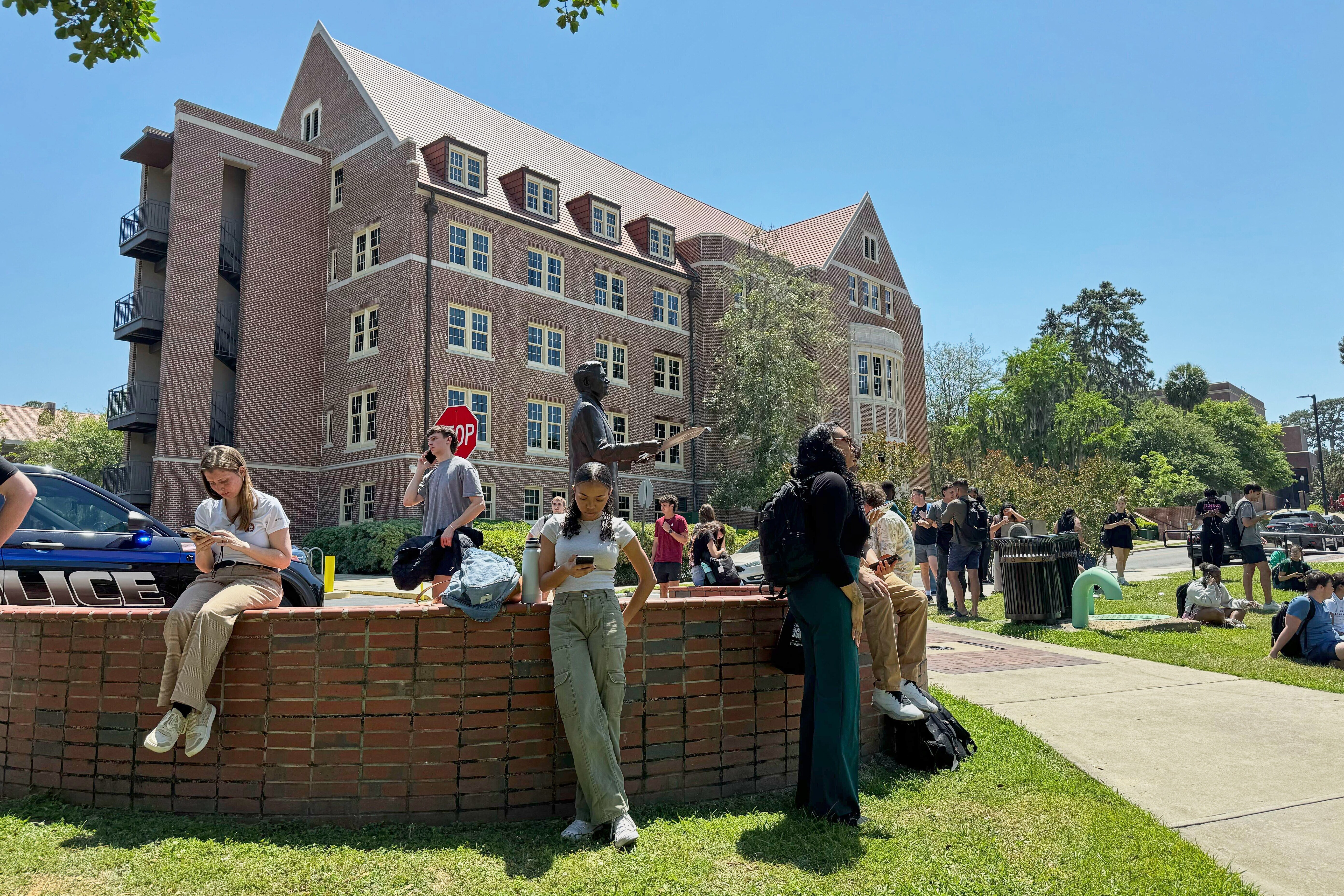 Florida State University students wait for news amid an active shooter incident at the school's campus in Tallahassee, Fla., on Thursday. (AP)