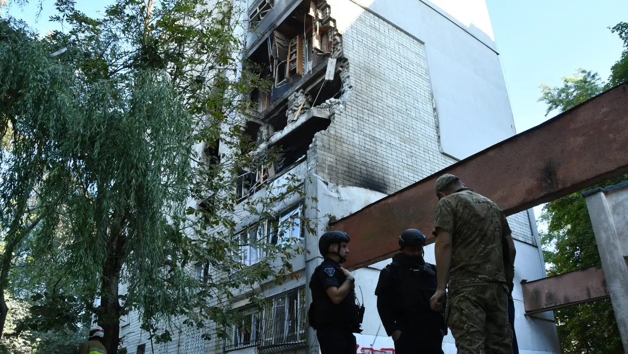Russian strikes across Ukraine kill 10 and a missile falls in Poland