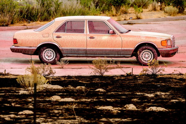 Fire retardant coats a vehicle following the Bug Fire near Reno, Nev., Thursday, Aug. 13, 2026.