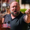 Infowars founder Alex Jones speaks to the media outside Waterbury Superior Court during his 2022 defamation trial in Waterbury, Conn.