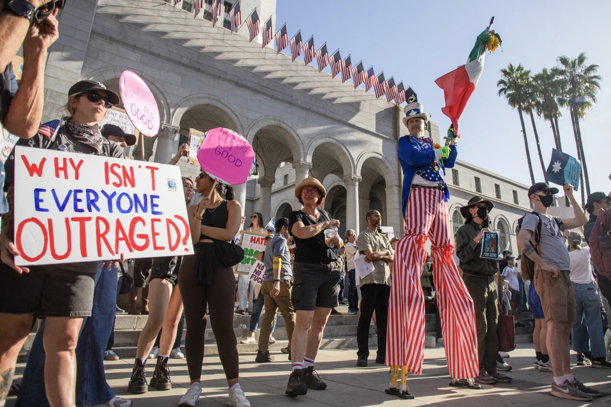 Protesters demonstrate against federal immigration actions at an 'ICE Out of Everywhere' rally in front of City Hall in downtown Los Angeles on Jan. 31.