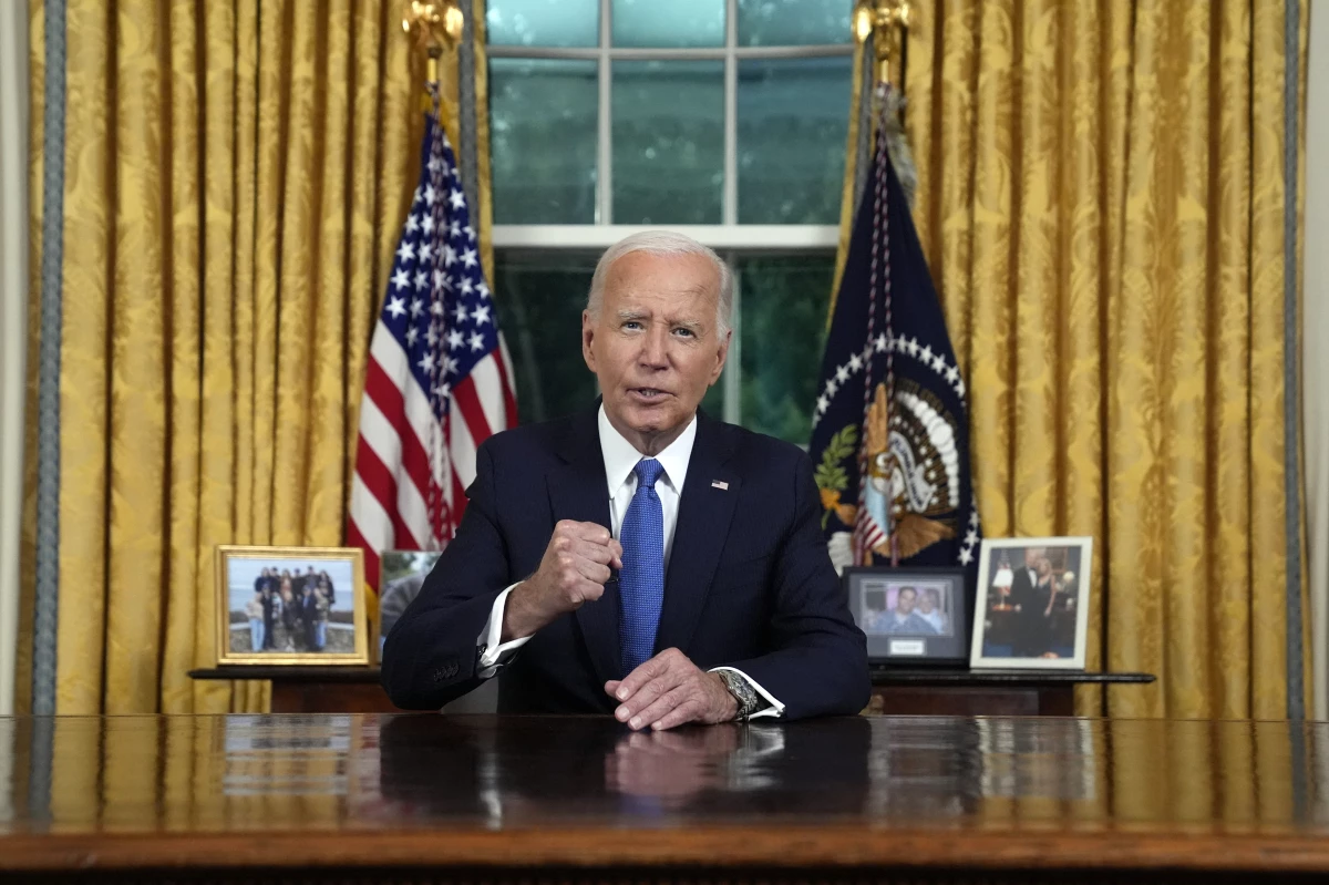 President Biden speaks during an address to the nation about his decision to not seek reelection in the Oval Office at the White House on Wednesday.