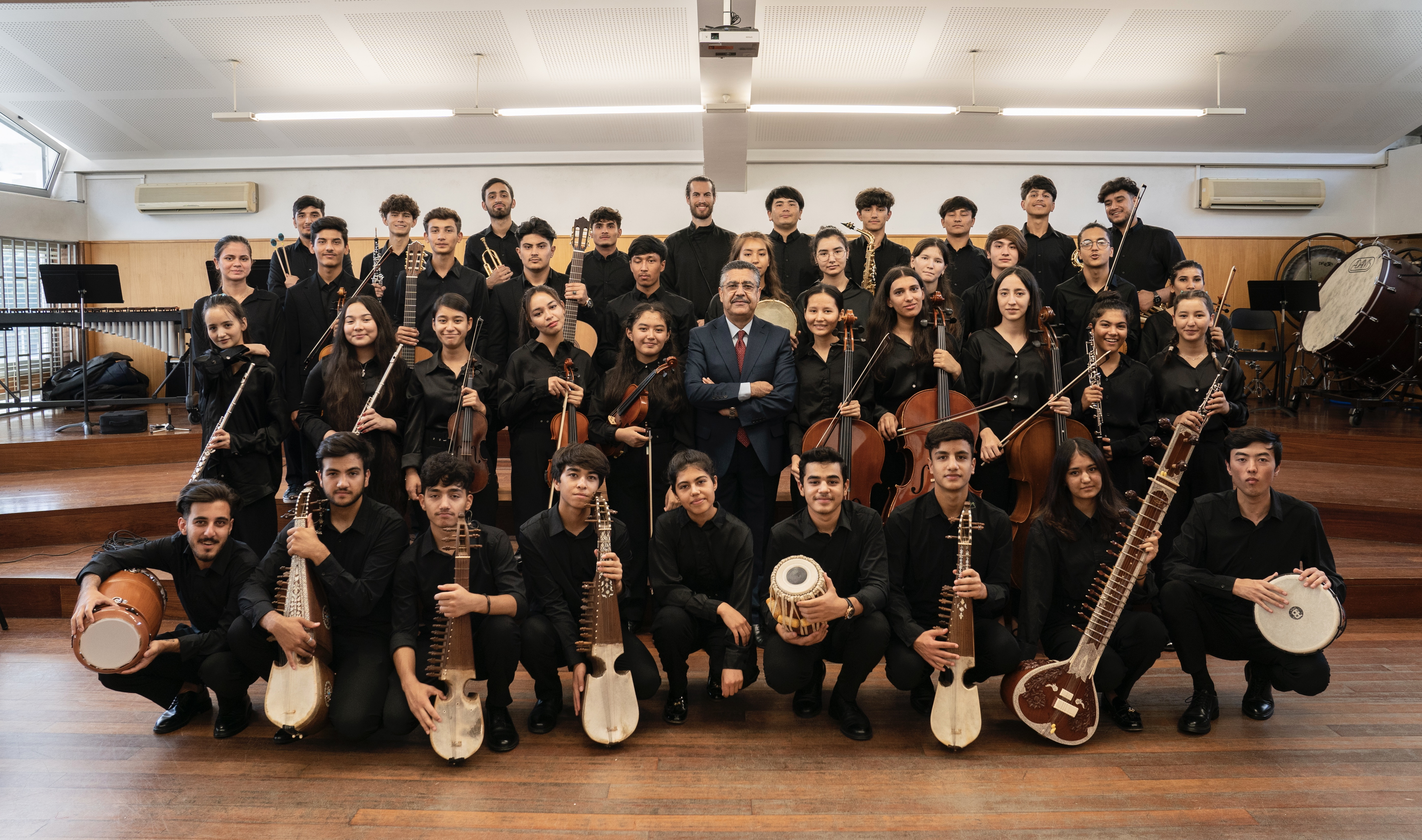 The Afghan Youth Orchestra with its founder, Ahmad Sarmast.