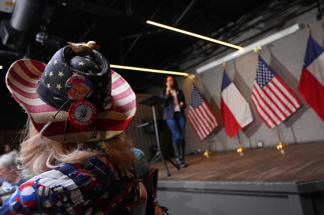 The hat of Diane Benjamin, Dallas #2021 precinct chair, is visible at a campaign event for Texas Attorney General Ken Paxton on May 18, 2026, in Dallas.
