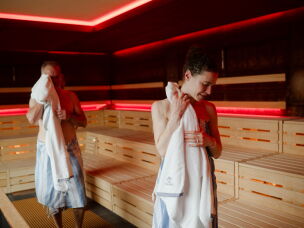 Sauna scientists Ashley Mason (right) and Dr. Hans Hägglund towel off after a session in the Japanese sauna at The Well, Oslo, Norway.