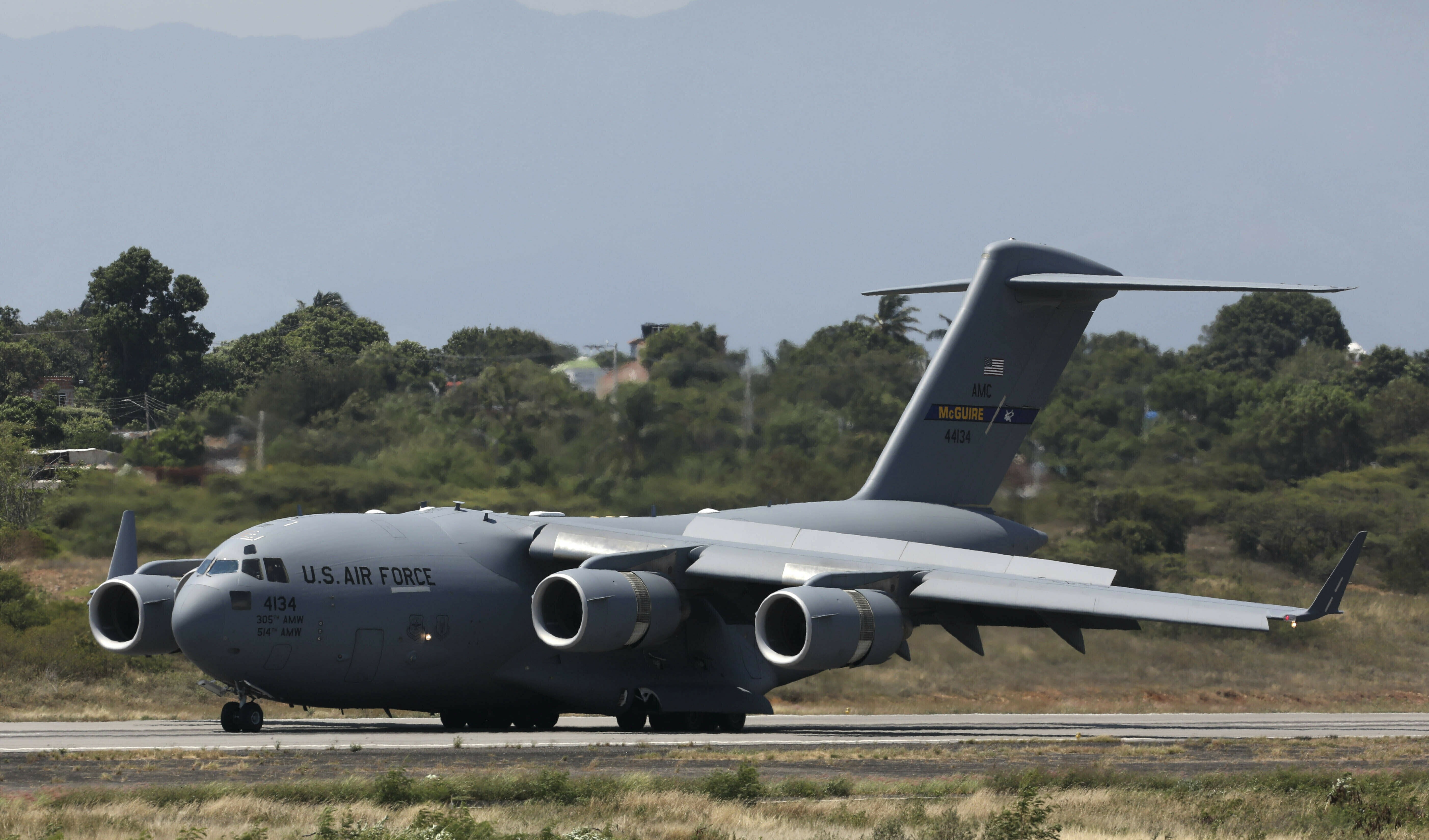 A United States Air Force C-17 cargo plane loaded with humanitarian aid lands at Camilo Daza airport in Cucuta, Colombia, on Feb. 16, 2019. (AP)
