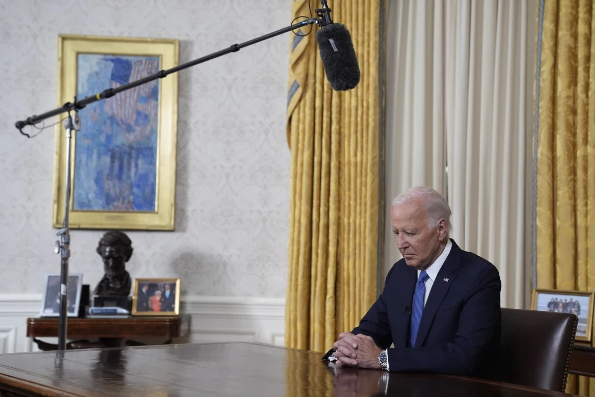 President Joe Biden pauses before he addresses the nation from the Oval Office of the White House in Washington on Wednesday about his decision to drop his Democratic presidential reelection bid.