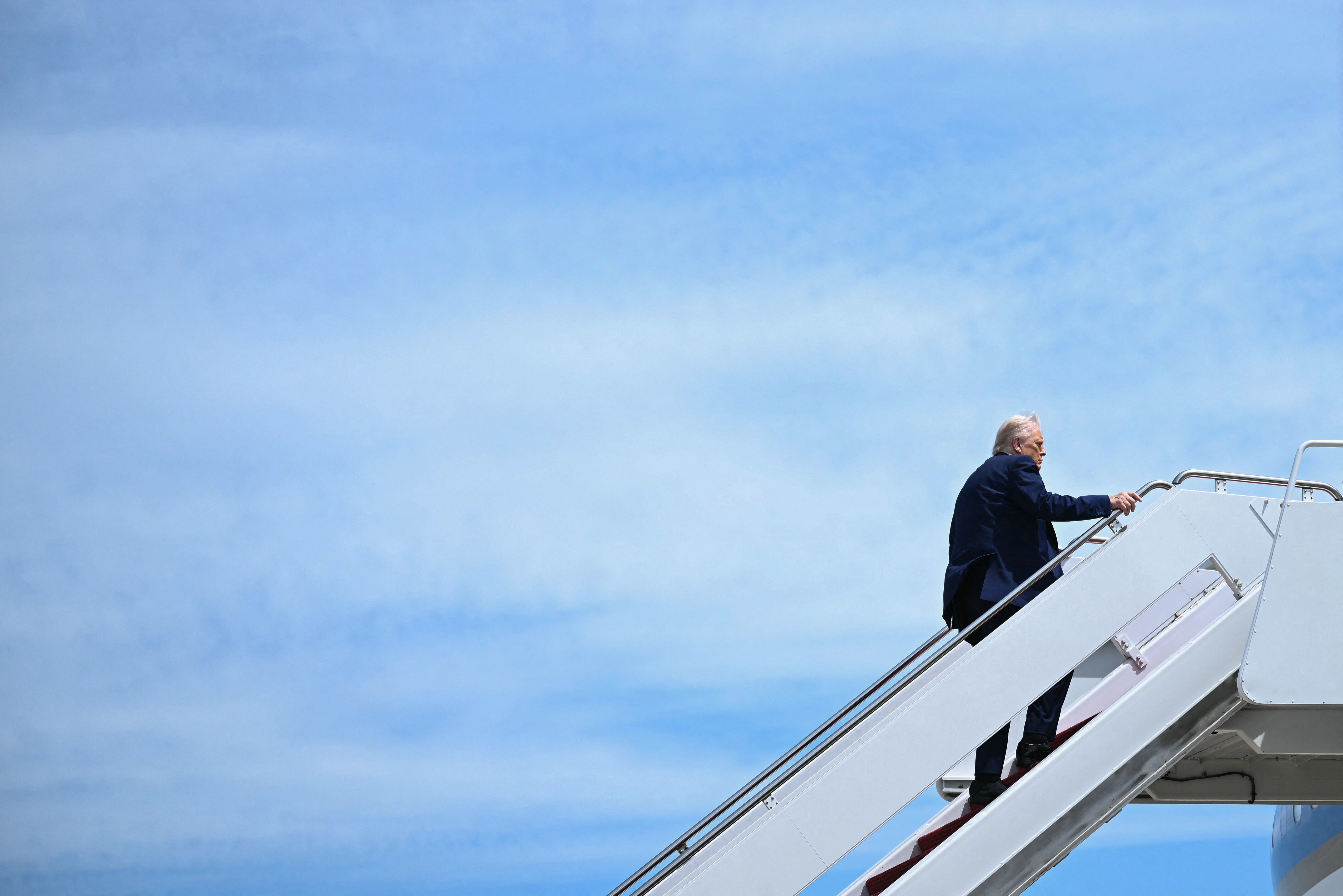 President Trump boards Air Force One at Joint Base Andrews in Maryland on May 12, 2025.