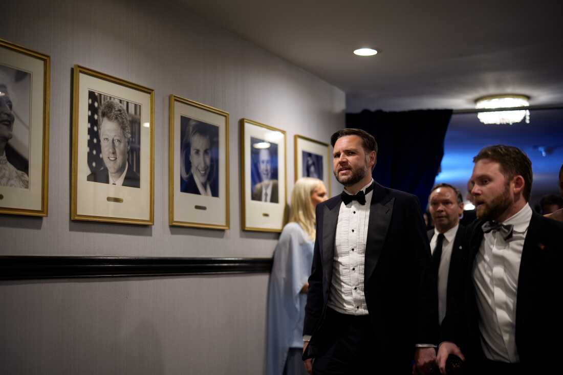 Vice President J.D. Vance walks back stage during a shooting incident at the annual White House Correspondents Association Dinner at the Washington Hilton on Saturday.