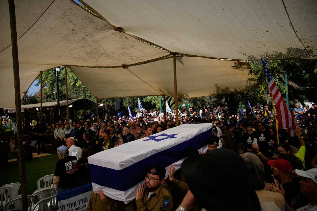 Israeli soldiers carry the flag-draped coffin of slain hostage Israeli-American Staff Sgt. Itay Chen during his funeral at Kiryat Shaul Cemetery in Tel Aviv, Israel, Sunday, Nov. 9, 2025, after his body was returned from Gaza.