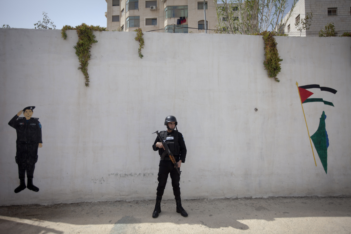 A Palestinian policeman stands during a training session of the Palestinian special police force in Ramallah on March 16, 2014.
