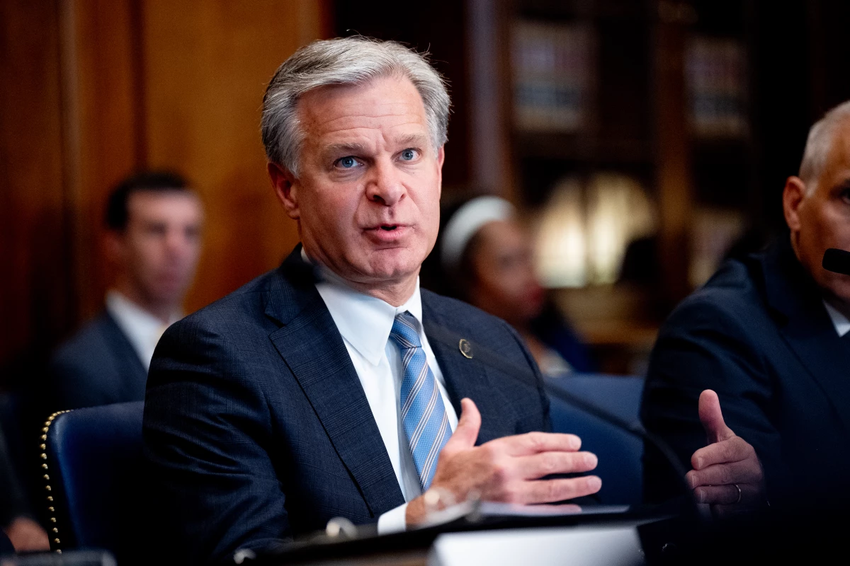 FBI Director Christopher Wray speaks during an Election Threats Task Force meeting at the Justice Department in September 2024.