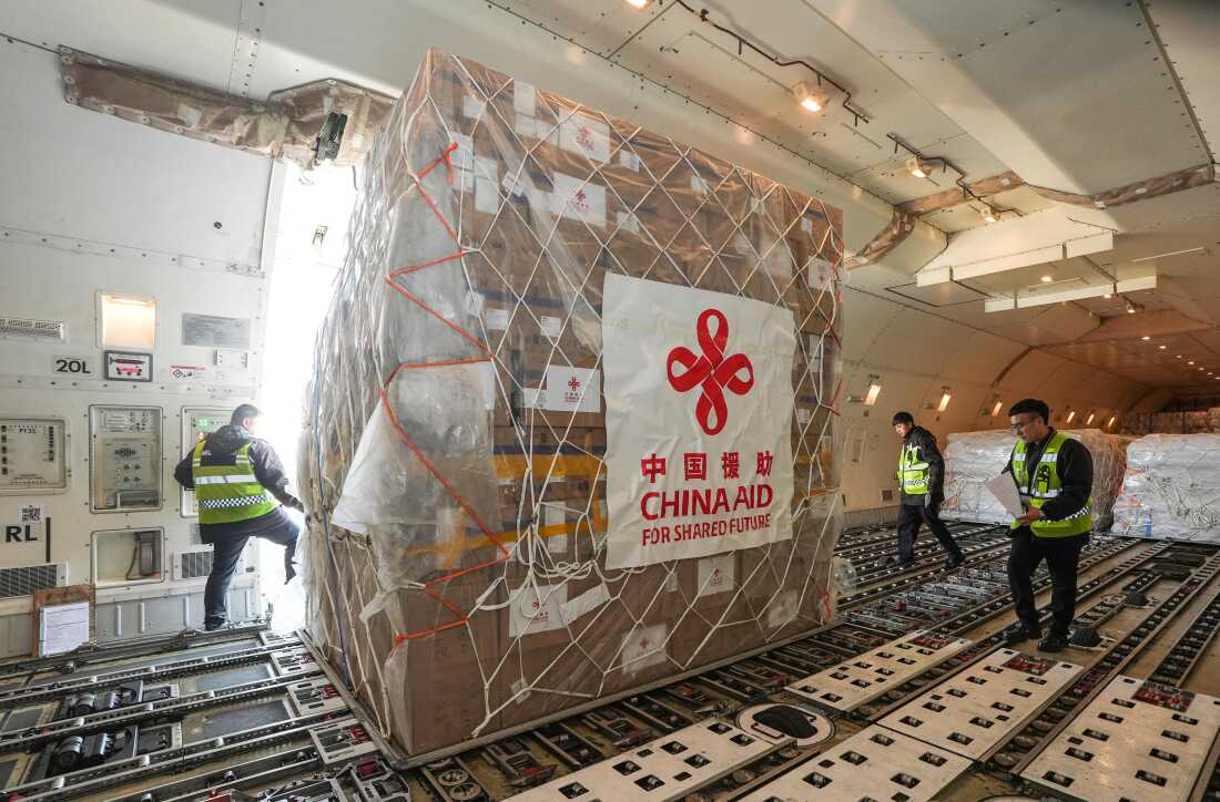 Chinese aid workers load emergency supplies, including tents, blankets and first aid kits, onto a flight from Beijing to Myanmar on March 31, 2025. After an earthquake hit Myanmar on March 28, 2025, China pledged about $135 million in humanitarian aid for earthquake relief. The U.S. pledged about $9 million.