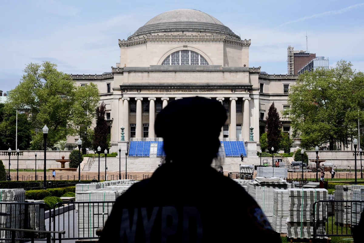 A New York City police officer looks over the center of Columbia University ahead of a large graduation ceremony in May, following weeks of pro-Palestinian protests.