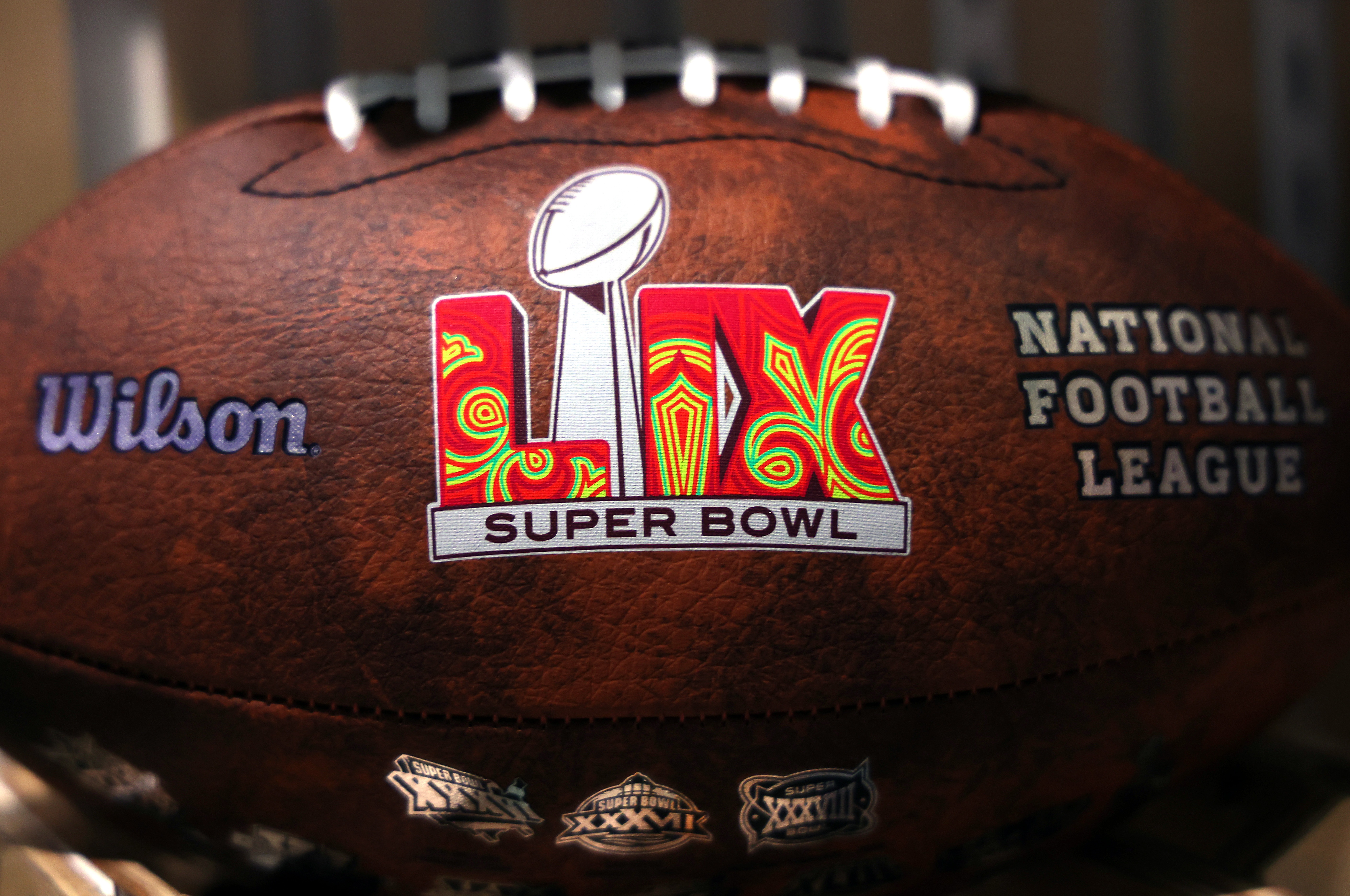 A detail of footballs at the NFL Experience fan festival ahead of Super Bowl LIX on February 07, 2025 in New Orleans, Louisiana.