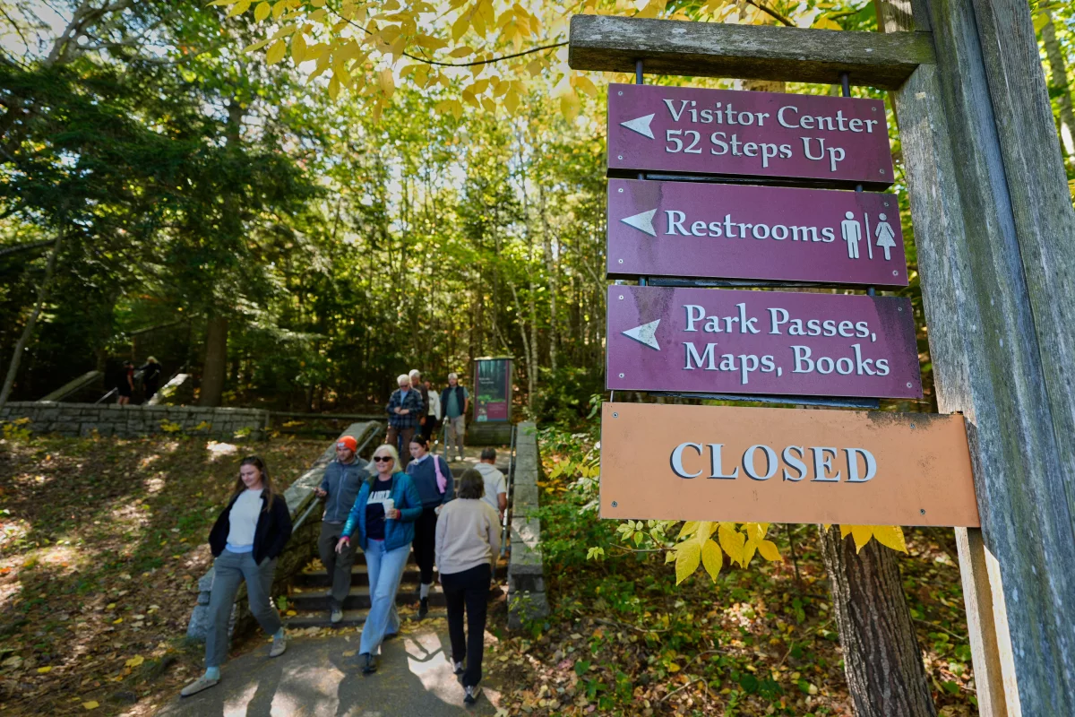 Tourists overlook the Grand Canyon at sunrise on Feb. 22, 2025 in Grand Canyon, Arizona.