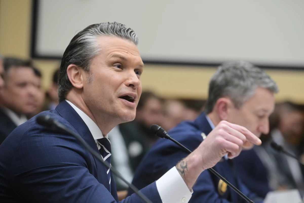Defense Secretary Pete Hegseth testifies about the Iran war before the House Armed Services Committee on Wednesday. Hegseth described the military operation as a major success and criticized 'defeatist' Democrats who pushed back against his assessment of the war.